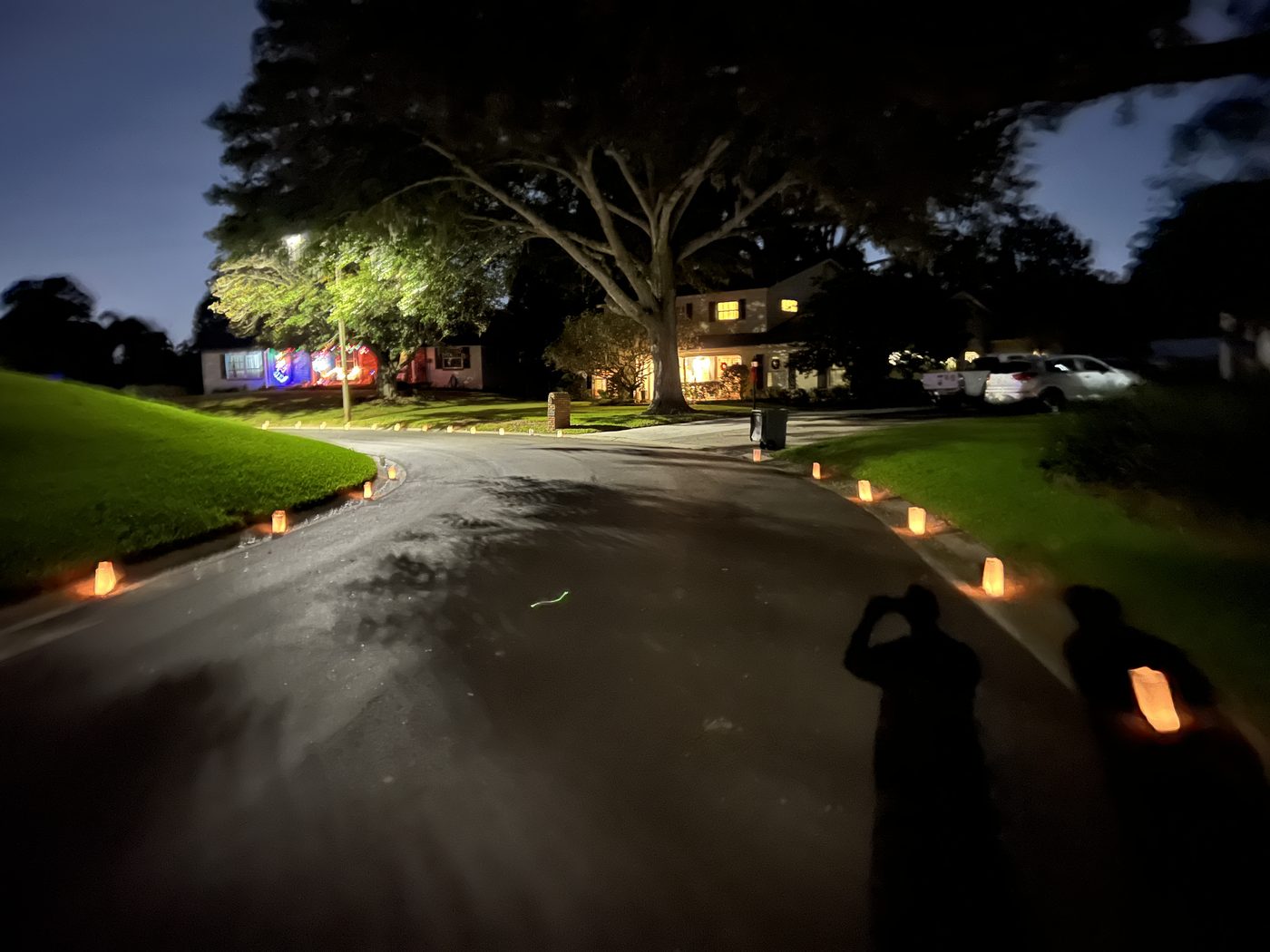 Luminaries lining the winding street in Lake Jewel Hills